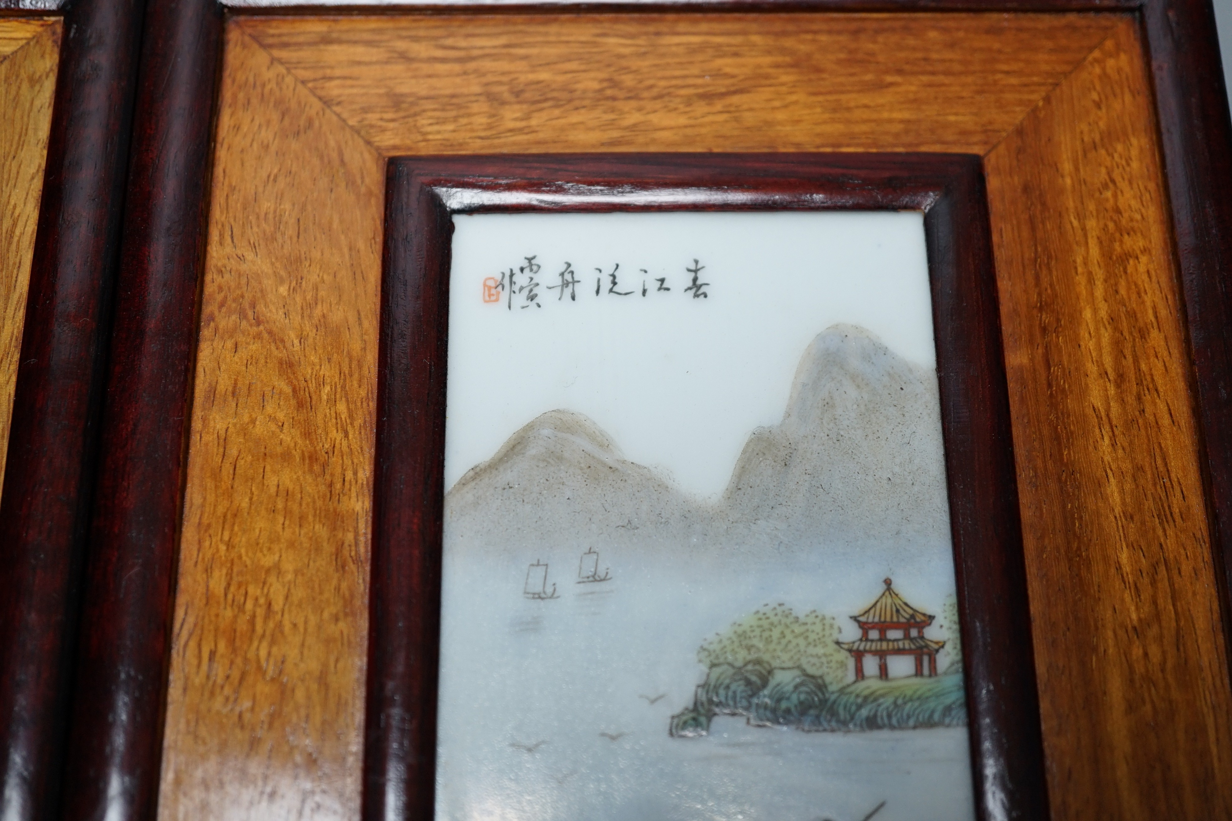 A pair of Chinese framed porcelain plaques 25x15cm including frame